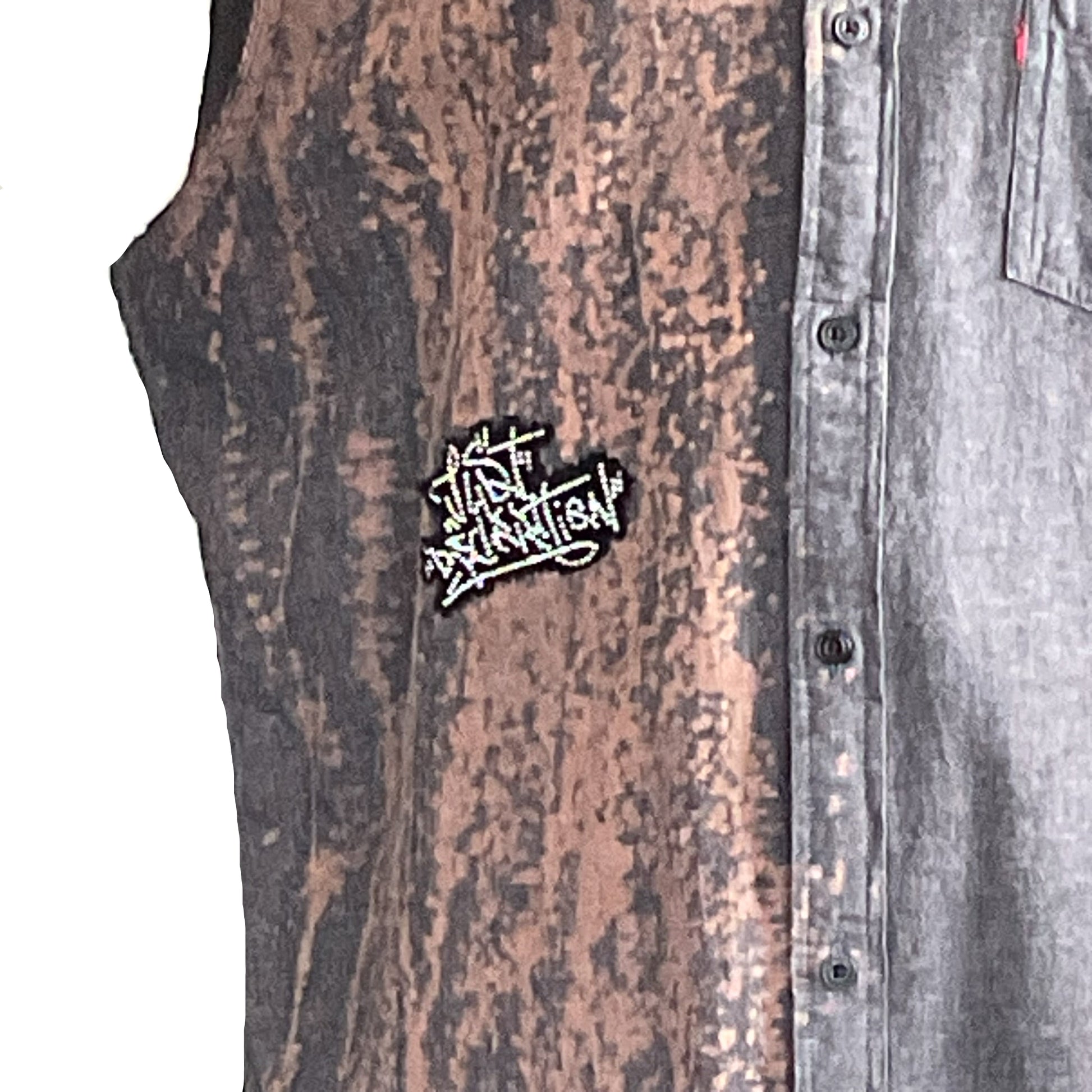 OVER REACTING graffiti-patch sleeveless shirt in acid-wash black and rusty-brown tones, 2XL, exudes bold, playful energy with its unique street-art style.