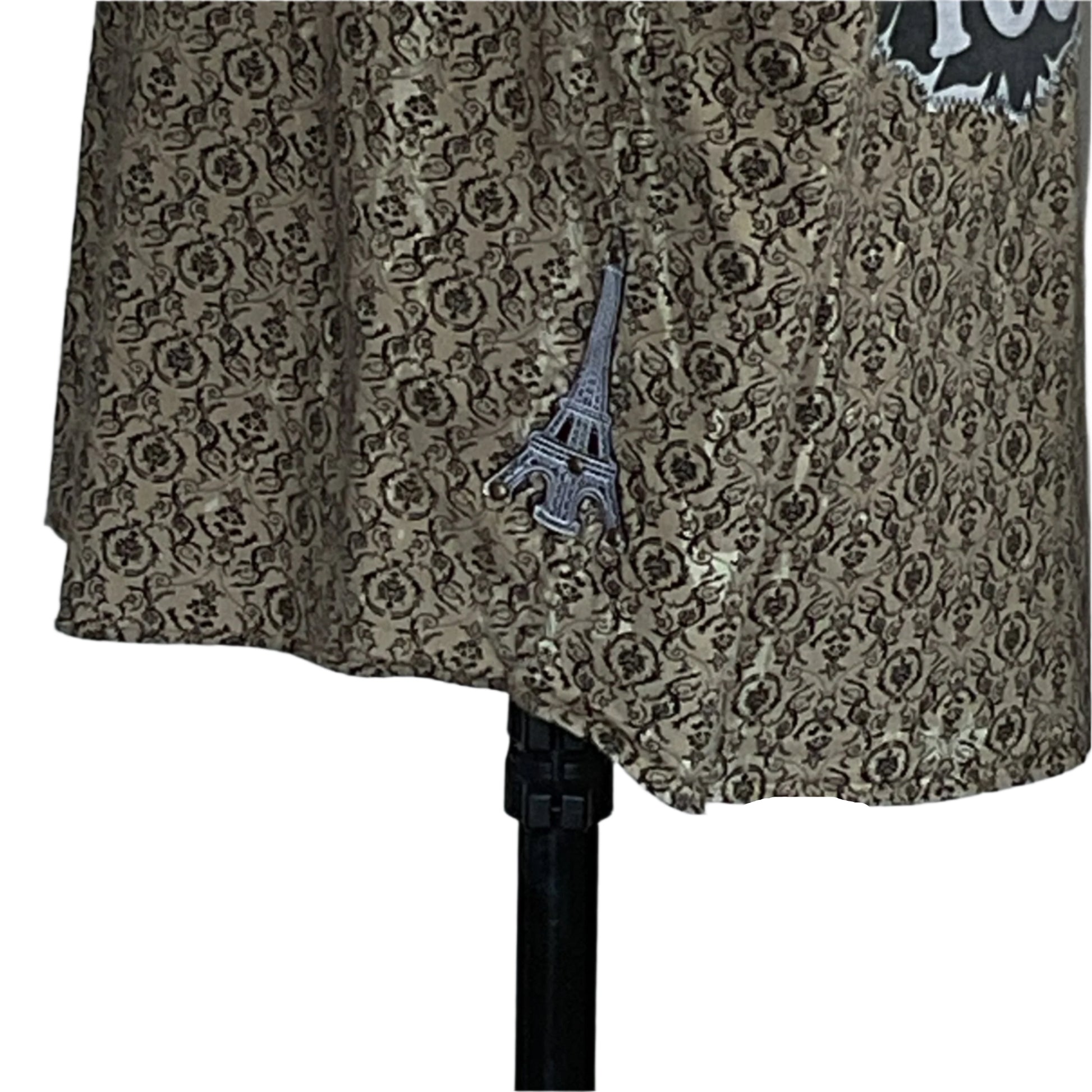 BEARDS 2XL sleeveless shirt with Eiffel Tower patch on floral medallion print fabric, displayed on a tripod stand, embodying bold, unique design.