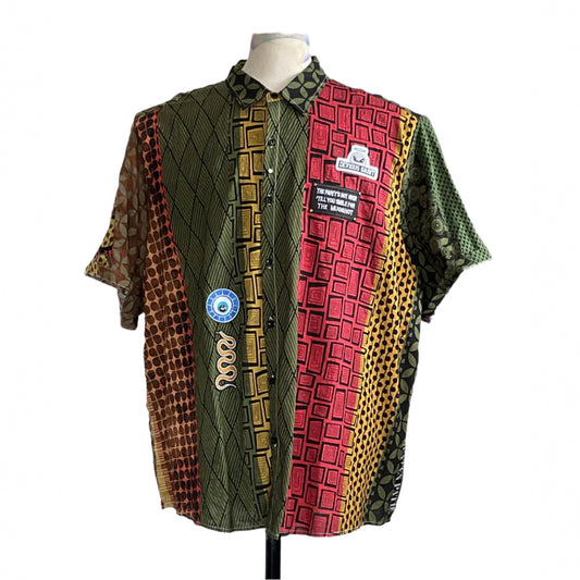 DRINK UP Men's Custom BEAR SIZE Sleeveless Shirt, 3XL, features African-inspired prints, geometric motifs, and bold patches, embodying DEVIOUS SAINT's unique, artful style.