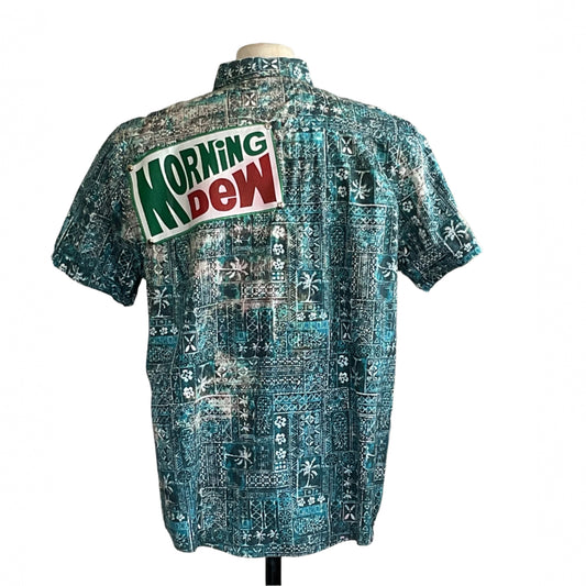 Teal-green button-up shirt labeled Morning Dew, draped on a dress form, embodying bold, unique style in 2XL from DEVIOUS SAINT.
