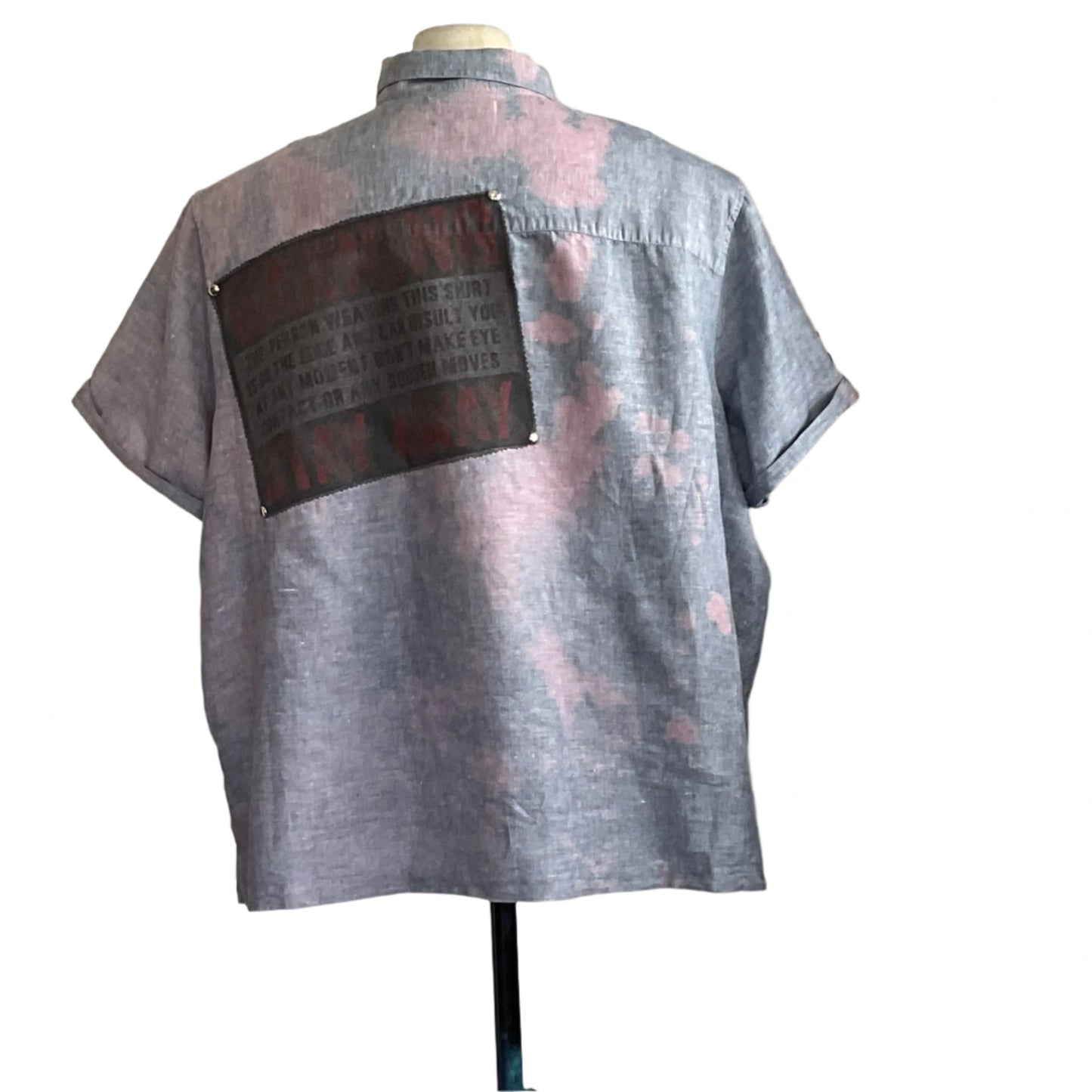 WARNING INSULTS men's custom BEAR SIZE short sleeve shirt in 4 XL, featuring pink-bleach splotches and a black patch on the back, on display.