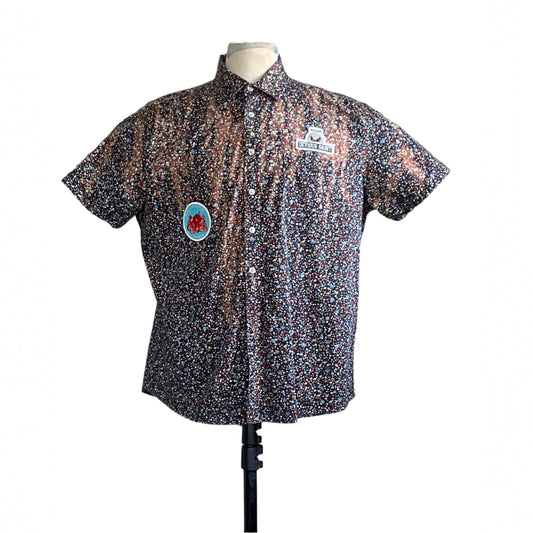 RETIRE | Men's Custom BEAR SIZE Short Sleeve Shirt features multicolored speckle print, DEVIOUS SAINT patch, and round blue patch, size XL.