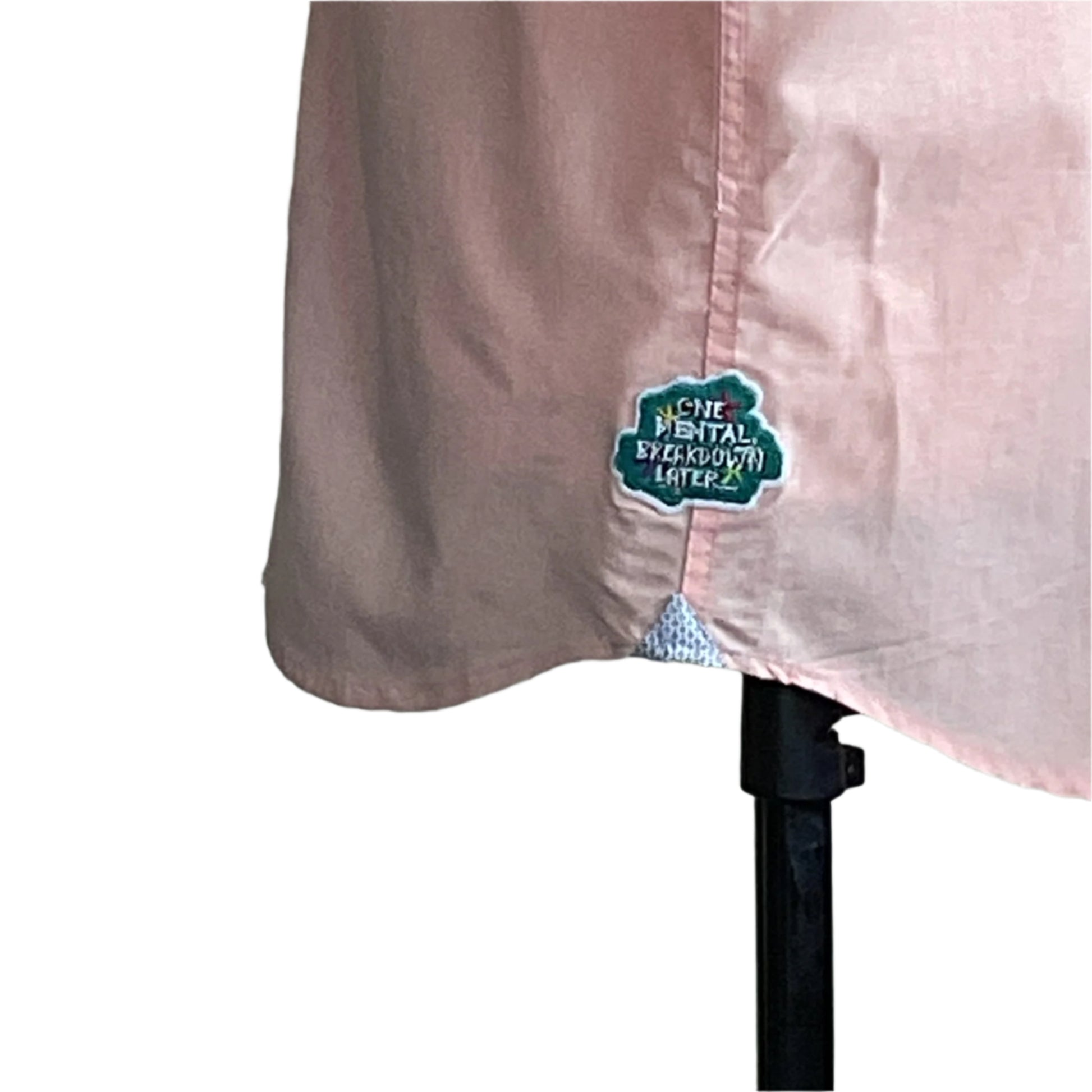 RAMEN | Men's Custom BEAR SIZE Short Sleeve Shirt in XL, featuring a decorative patch and checkered trim at the hem, draped over a mannequin stand.