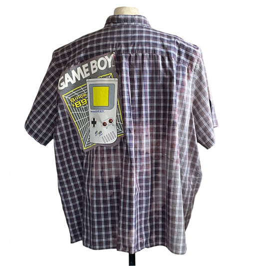 Back view of a 5 XL men's purple-and-white plaid shirt with a Game Boy patch, showcasing DEVIOUS SAINT's unique, wearable art style.
