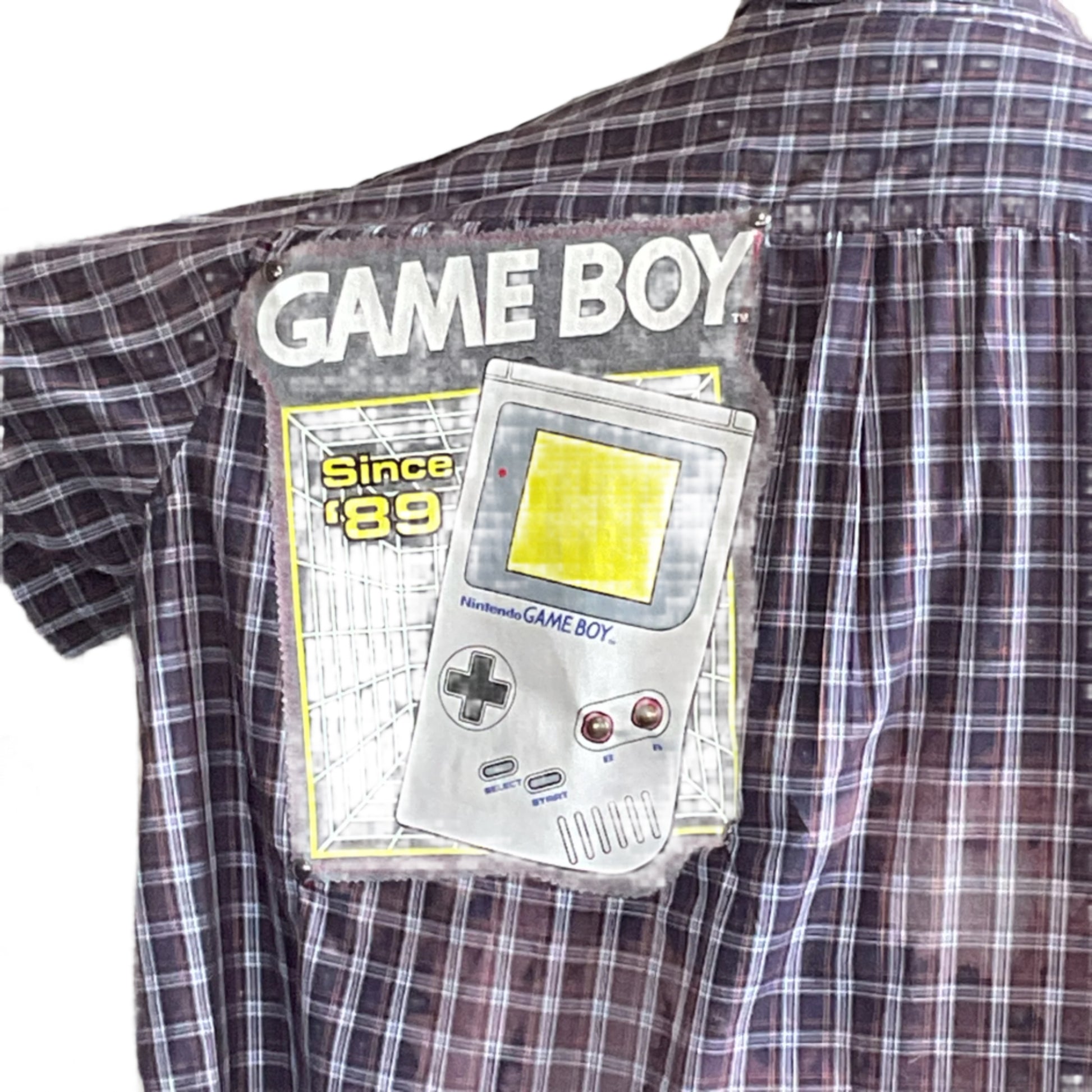 GAME BOY | Men's Custom BEAR SIZE Short Sleeve Shirt features a bold Game Boy patch on plaid, emphasizing unique, artistic design in size 5 XL.