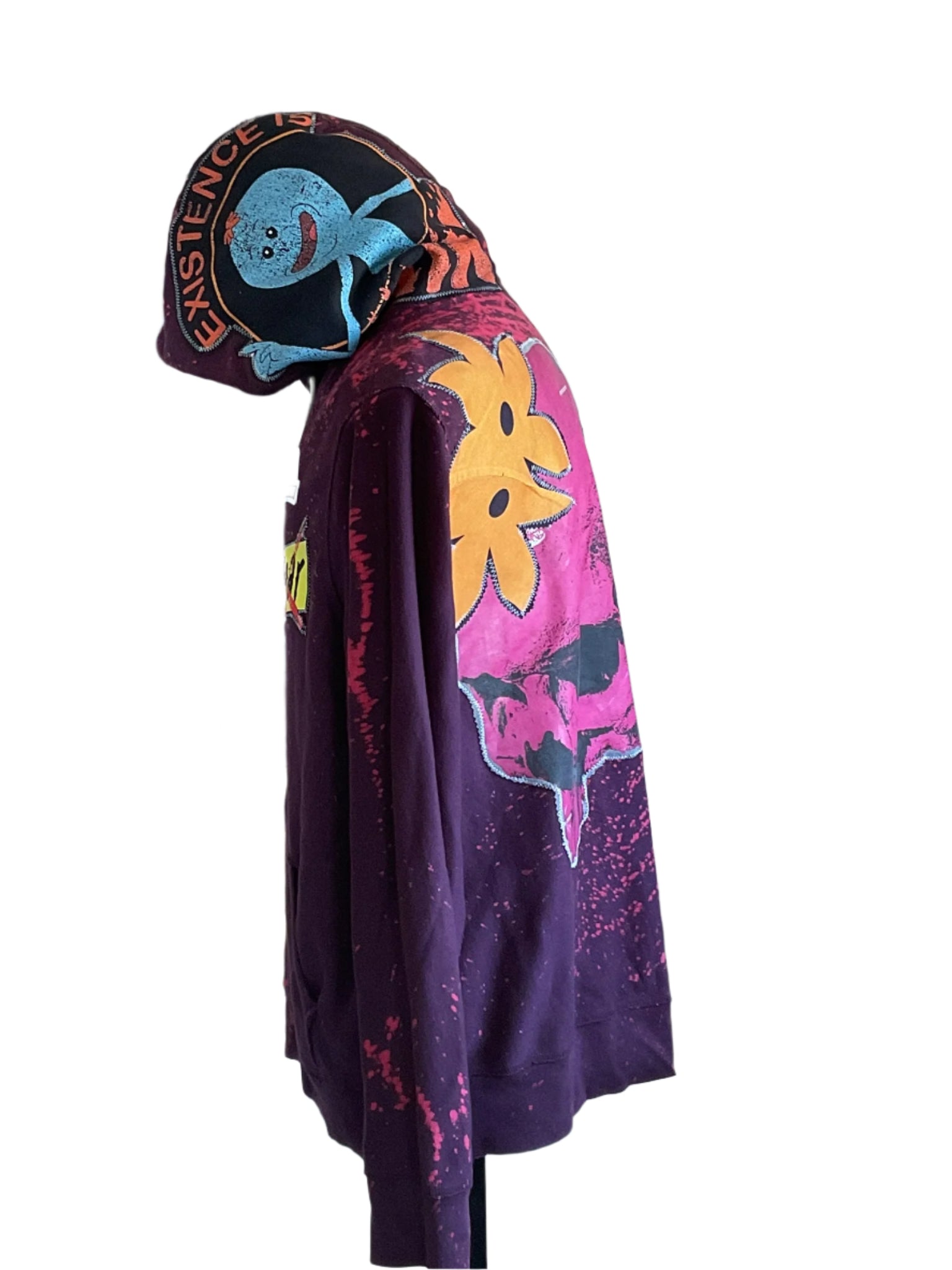 Purple pullover hoodie with splatter-dye, featuring Mr. Meeseeks graphic on hood. Bold graphics enhance the ROSES FROM CONCRETE Custom Men's Hoodie for a vibrant streetwear look.