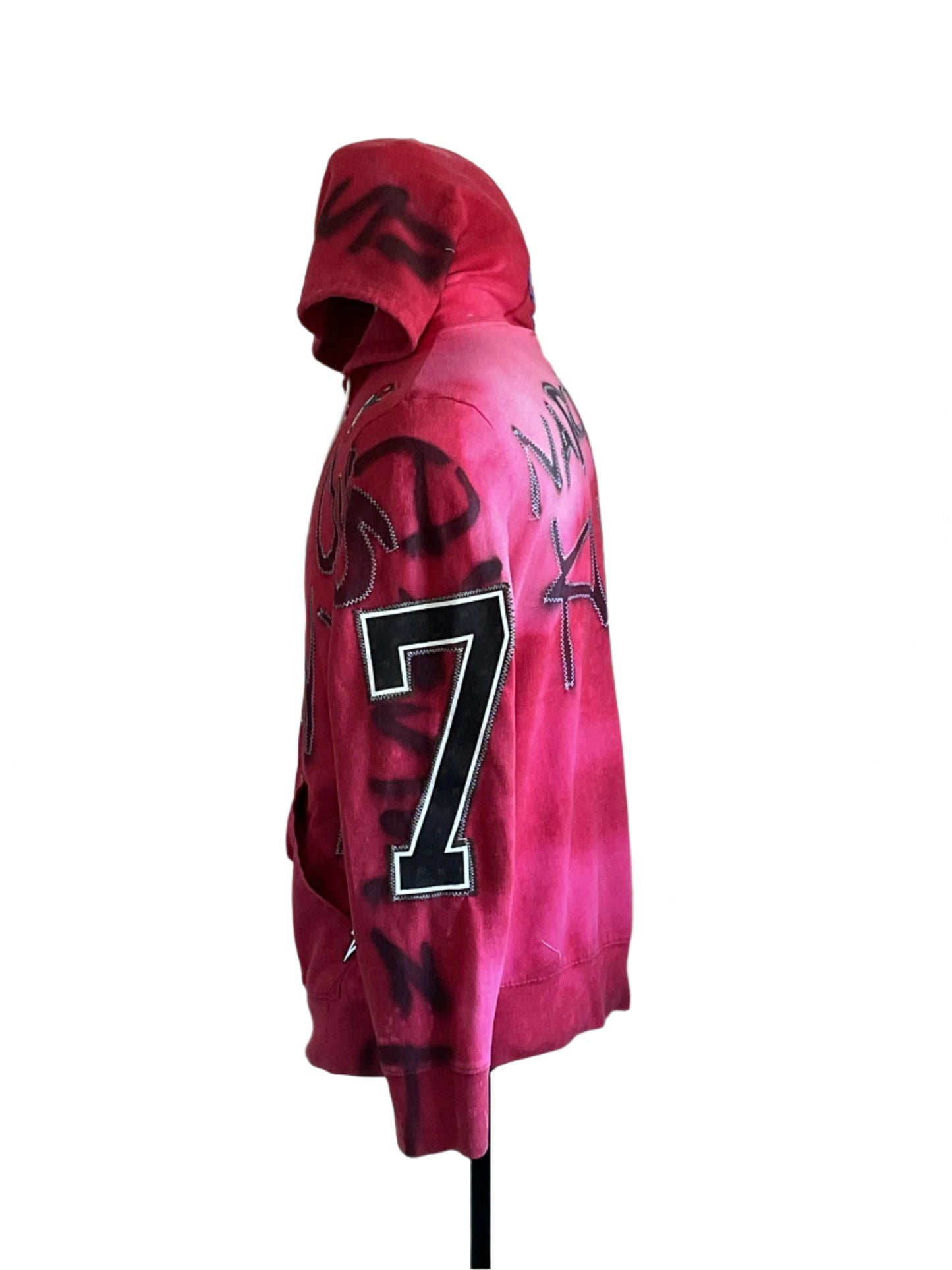 DEVIOUS SAINT Custom Men's Hoodie with graffiti-style paint, stitched embellishments, and a '7' patch, showcasing a bold, unique, and artistic design.