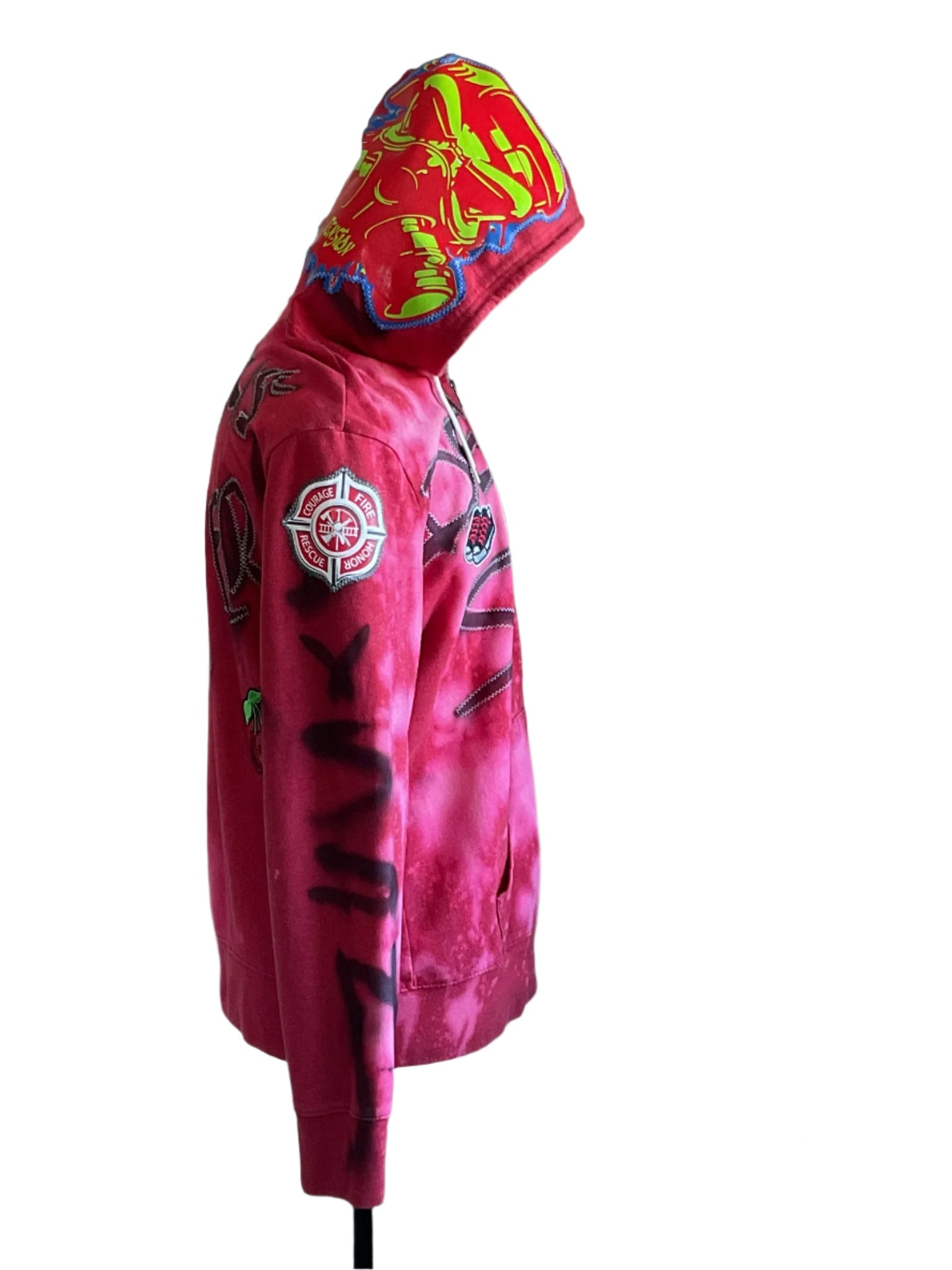 DEVIOUS SAINT Custom Men's Hoodie: Red tie-dyed hoodie with graffiti graphics, patches, and Fire Rescue emblem on sleeve, featuring street-wear style for bold, modern men.